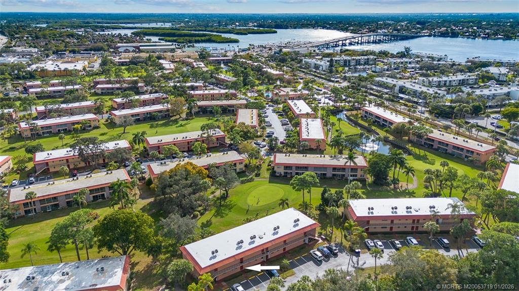 1909 Southwest Palm City Road, Unit B Stuart, FL 34994 - Photo 34 of 36 an aerial view of a city with lots of residential buildings