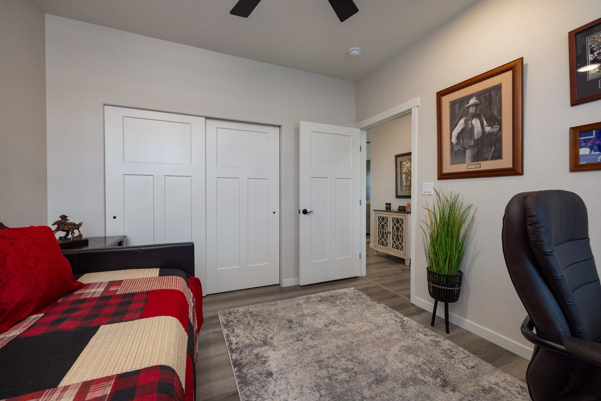 2454 Ross Road Grand Junction, CO 81505 - Photo 12 of 31 a living room with furniture and a rug