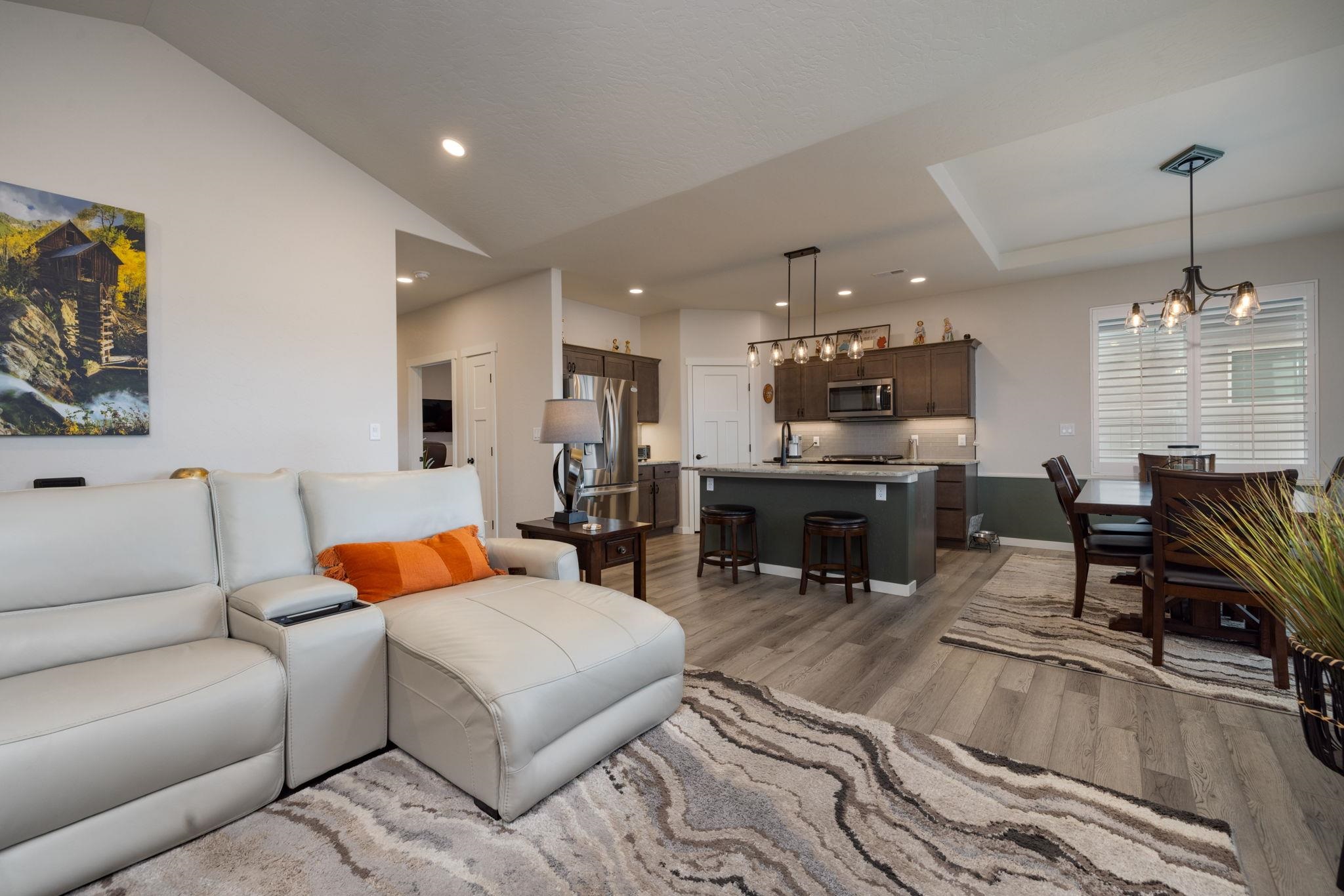 2454 Ross Road Grand Junction, CO 81505 - Photo 19 of 31 a living room with furniture and kitchen view