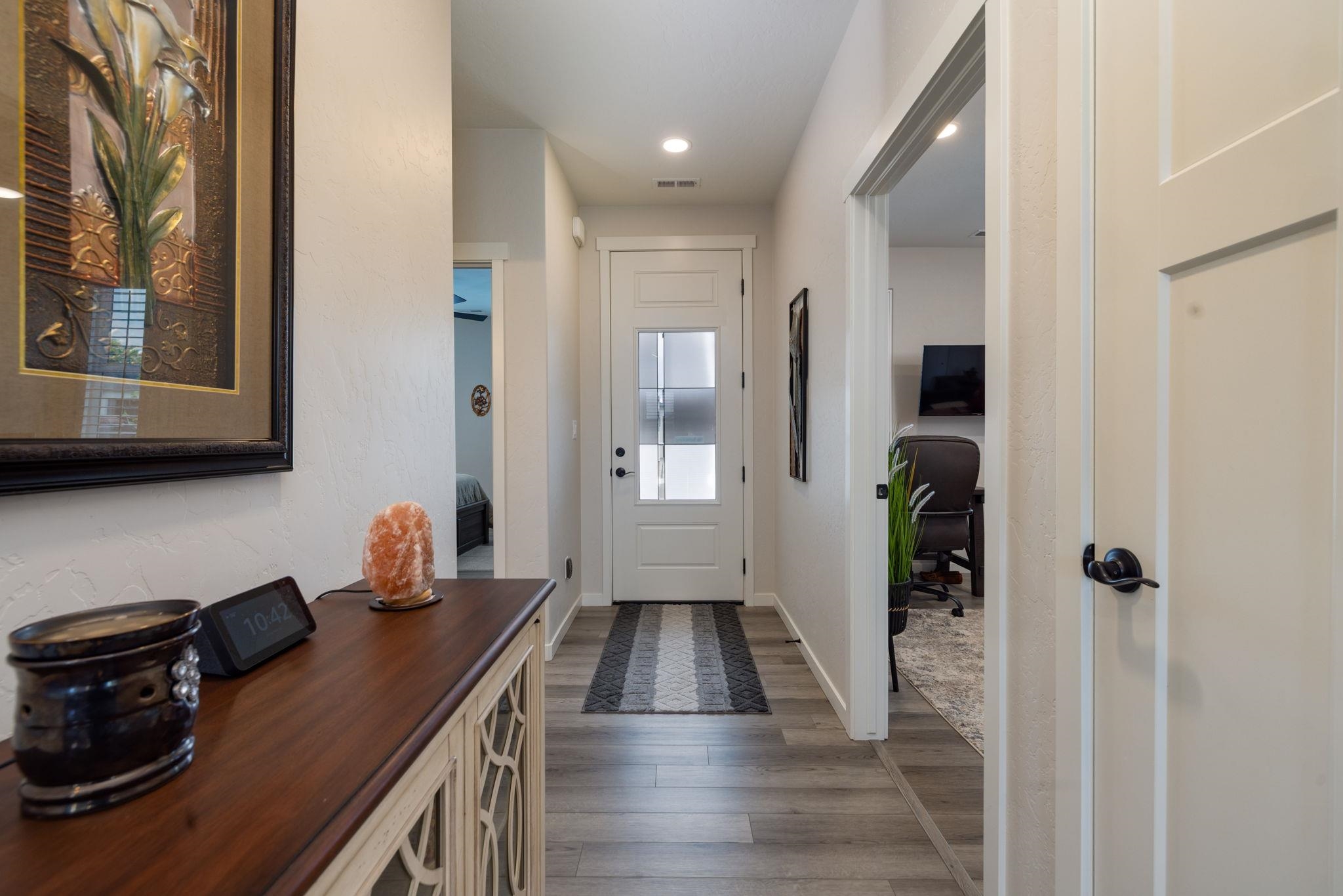 2454 Ross Road Grand Junction, CO 81505 - Photo 9 of 31 a kitchen with a sink and wooden floor
