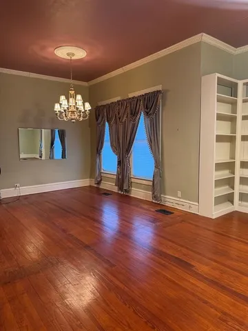 a view of livingroom with wooden floor