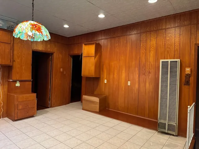 a view of an entryway with a chandelier