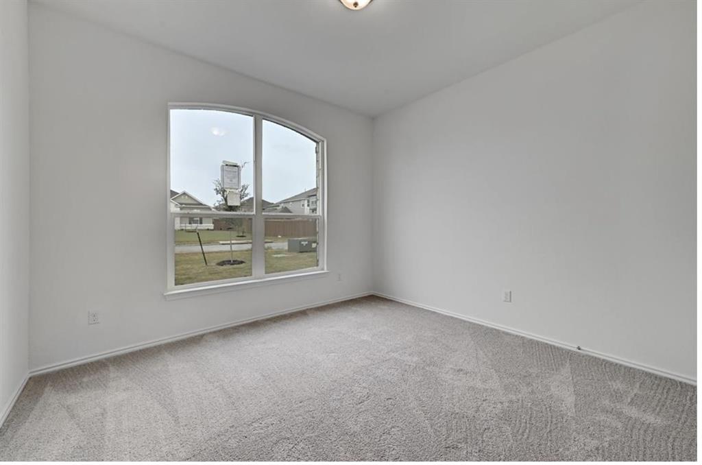 4553 Dugenta Place Round Rock, TX 78665 - Photo 28 of 38 a view of a room that has a window in it