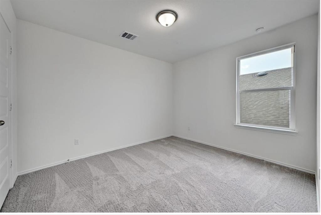 4553 Dugenta Place Round Rock, TX 78665 - Photo 32 of 38 an empty room with a window