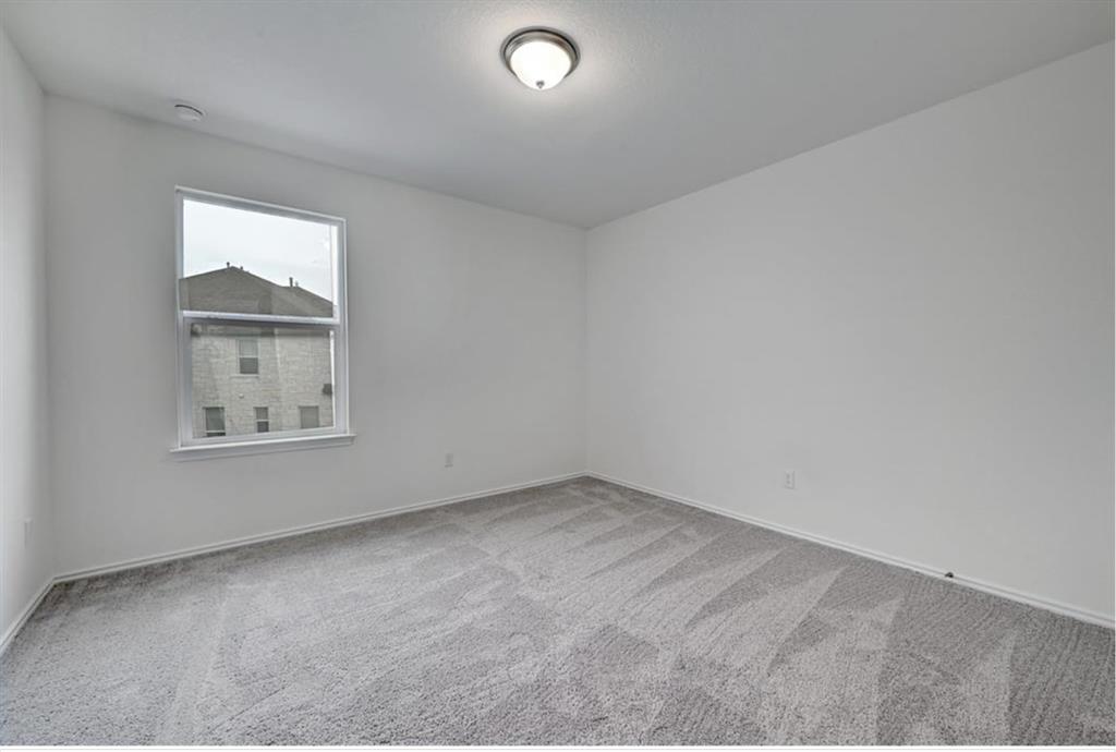 4553 Dugenta Place Round Rock, TX 78665 - Photo 33 of 38 an empty room with a window