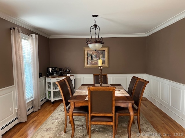 47 Merwin Brook Road Brookfield, CT 06804 - Photo 9 of 29 a dining room with furniture a chandelier and wooden floor