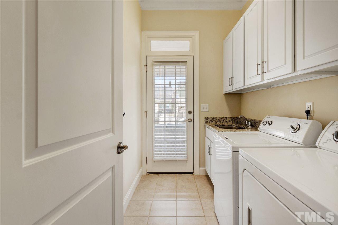 1585 Fullerton Place Raleigh, NC 27607 - Photo 17 of 30 a utility room with dryer and washer