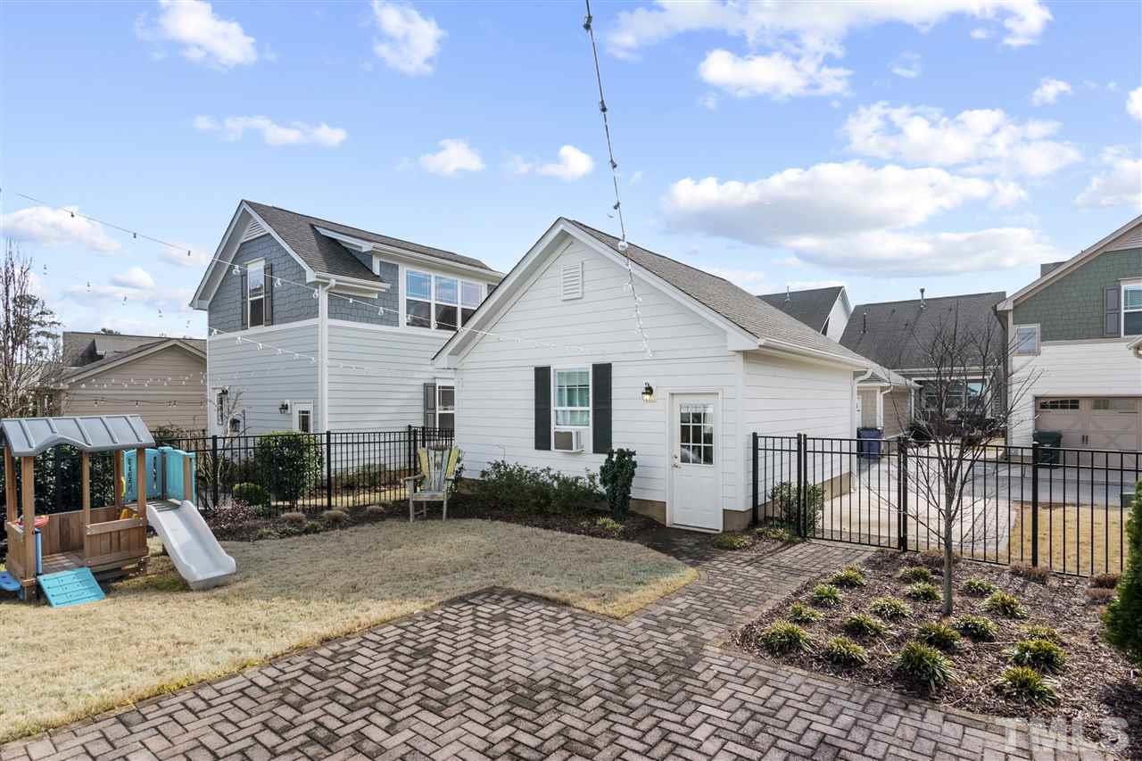1585 Fullerton Place Raleigh, NC 27607 - Photo 28 of 30 a view of a house with backyard