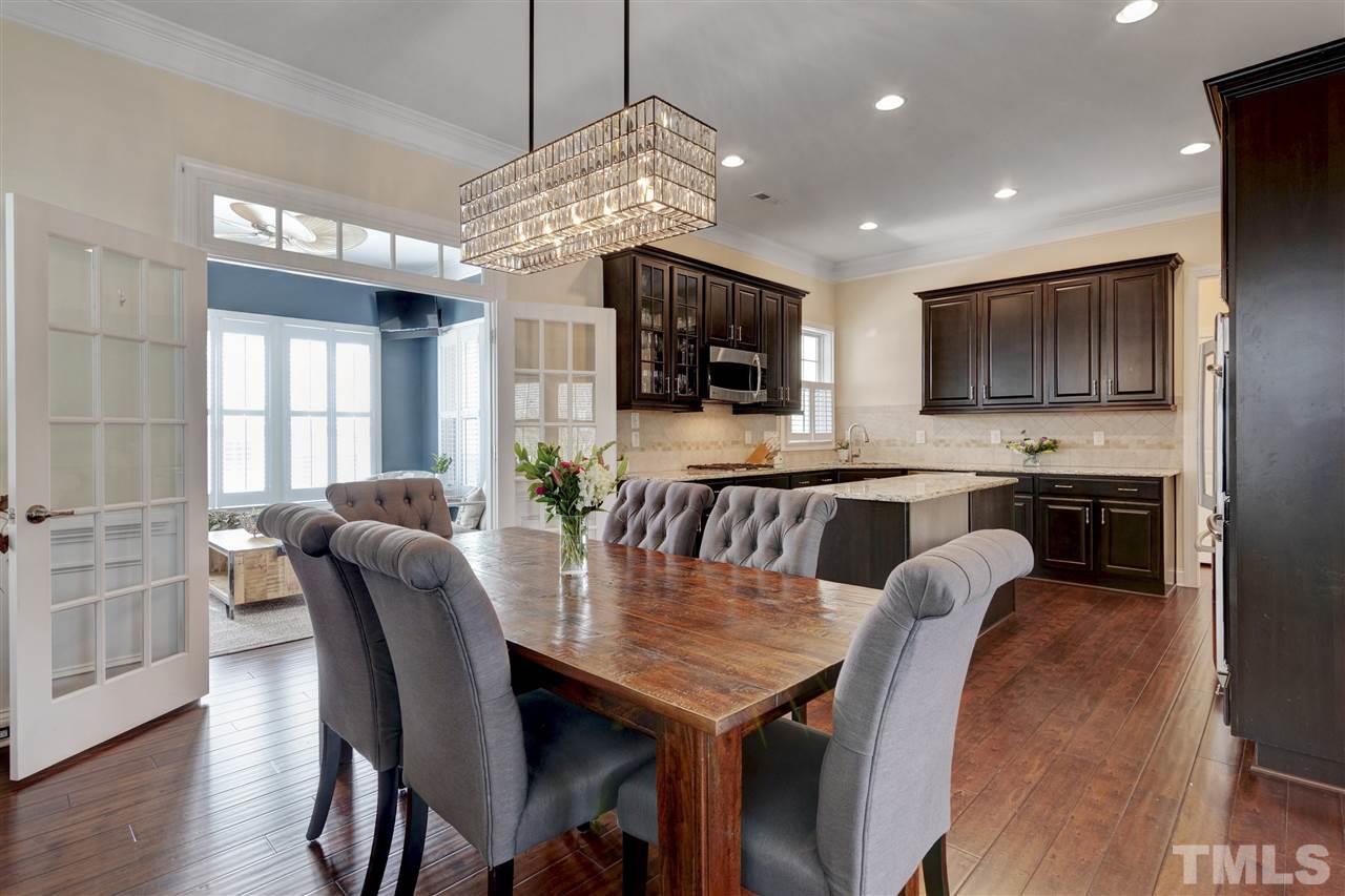 1585 Fullerton Place Raleigh, NC 27607 - Photo 9 of 30 a view of a dining room with furniture