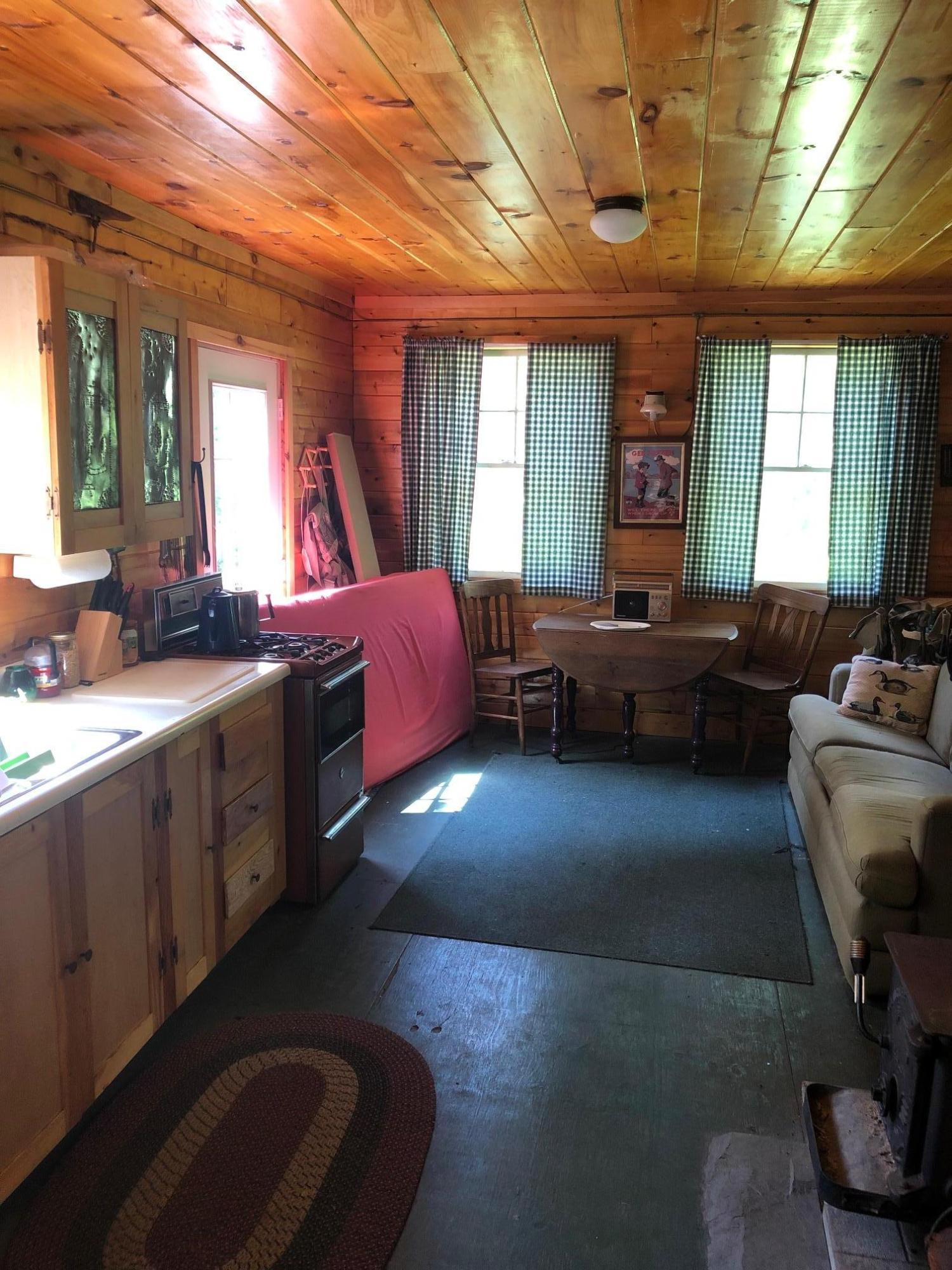 7 East Russell Pond Road South Houlton, ME 04730 - Photo 2 of 28 Living Area Photo I (Hunt Russell Pond)