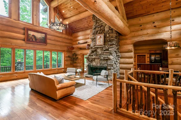a building outdoor space with patio furniture and wooden floor