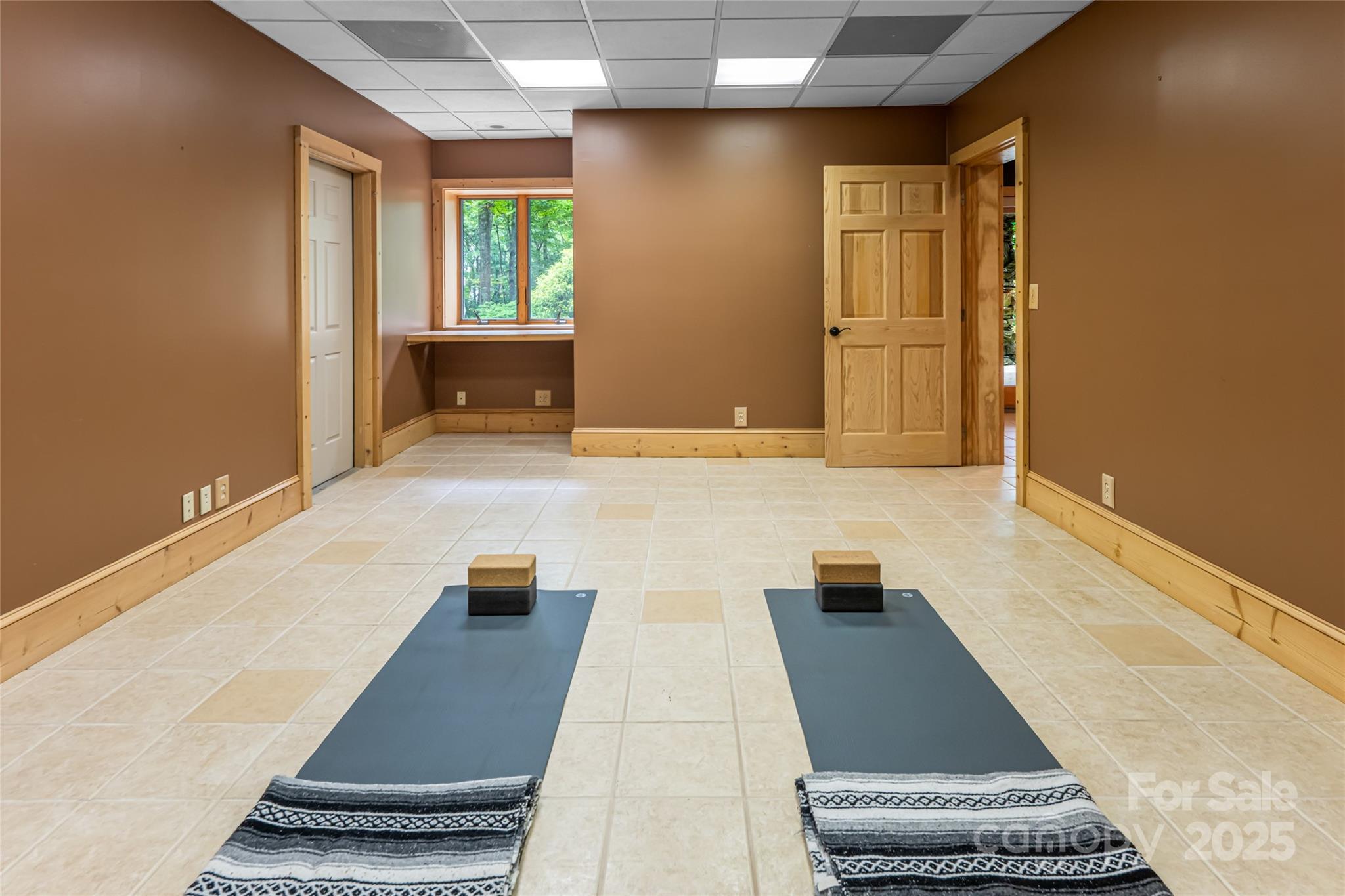 303 Flying Hawk Road Waynesville, NC 28786 - Photo 32 of 48 a bathroom with a sink and a mirror