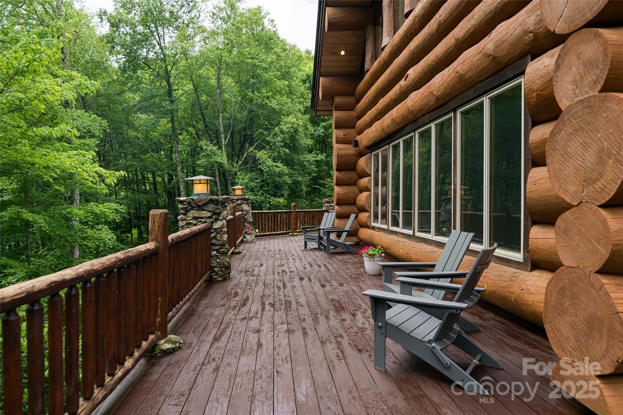 303 Flying Hawk Road Waynesville, NC 28786 - Photo 38 of 48 a view of balcony with wooden floor and outdoor seating