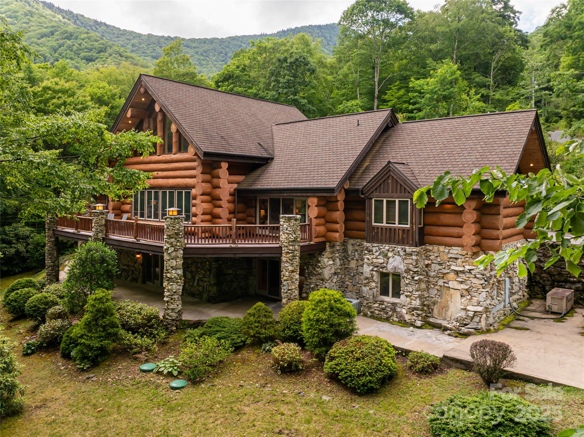 303 Flying Hawk Road Waynesville, NC 28786 - Photo 43 of 48 an aerial view of a house with yard swimming pool and outdoor seating
