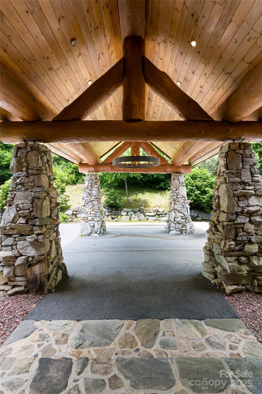 303 Flying Hawk Road Waynesville, NC 28786 - Photo 10 of 48 a view of a garage