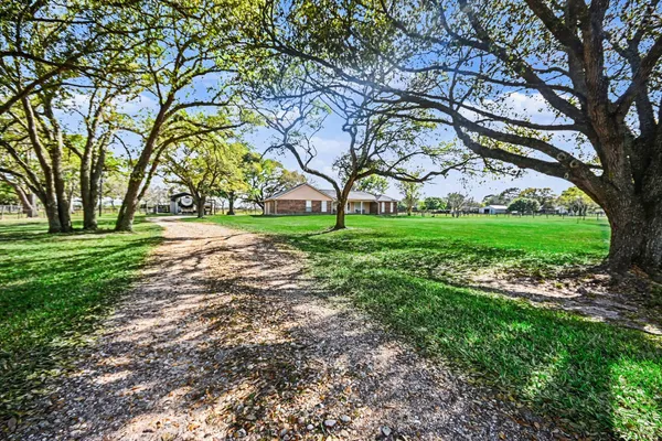 $475,000 | 21503 Pecan Bend Road, Damon, TX 77430