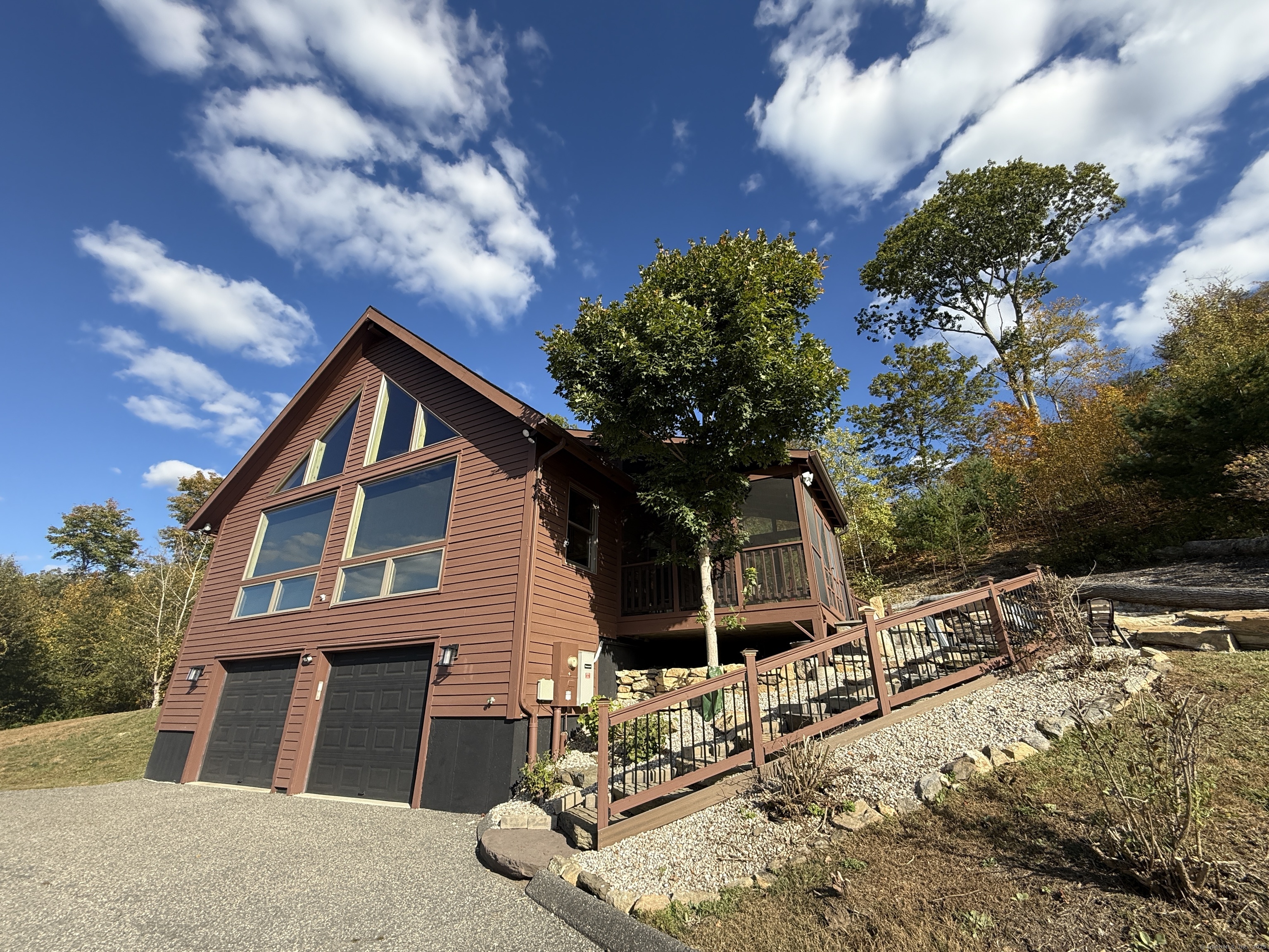 570 Long Mountain Road New Milford, CT 06776 - Photo 2 of 30 a front view of a house with a yard