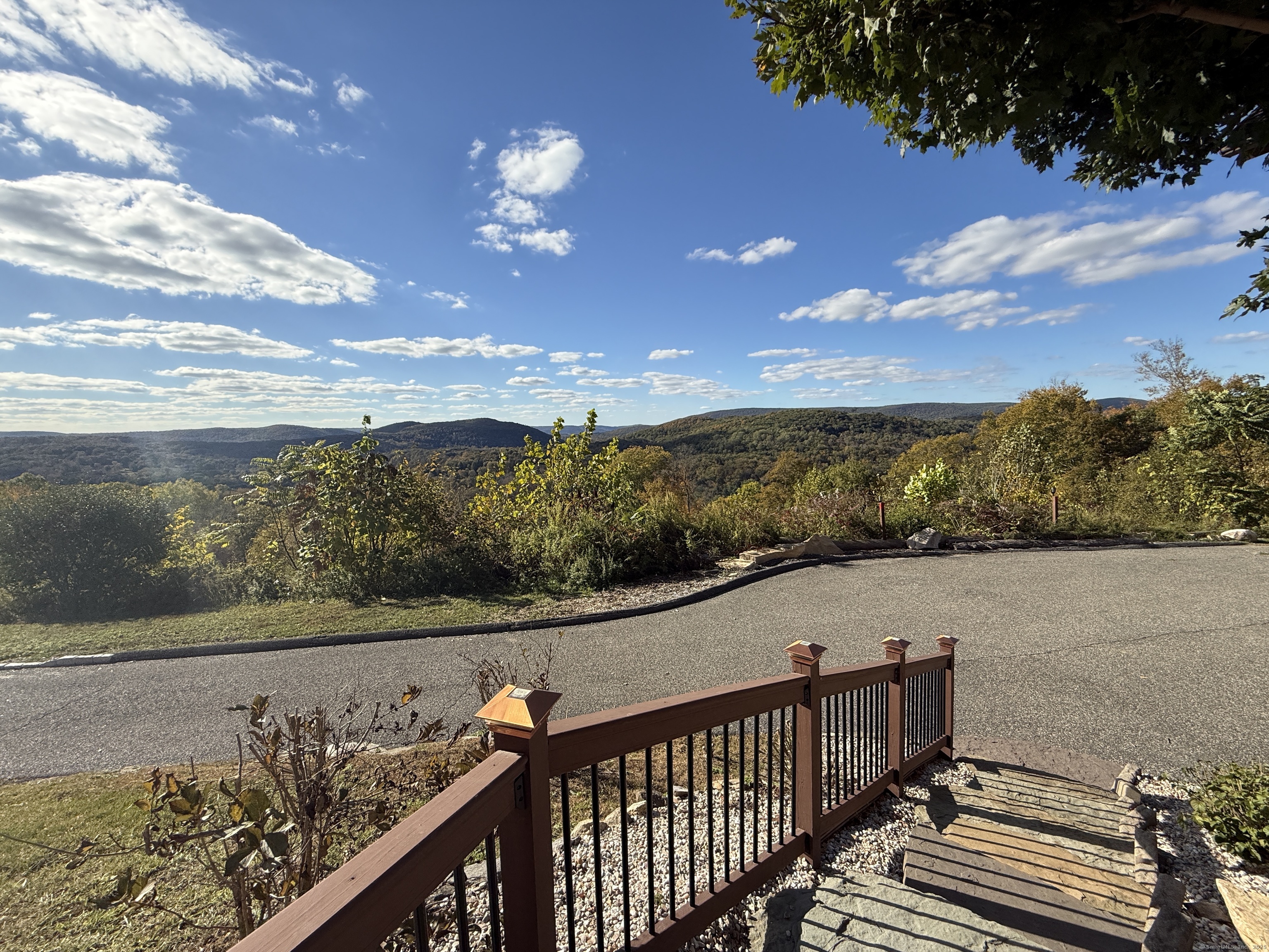 570 Long Mountain Road New Milford, CT 06776 - Photo 6 of 30 a view of a lake from a balcony