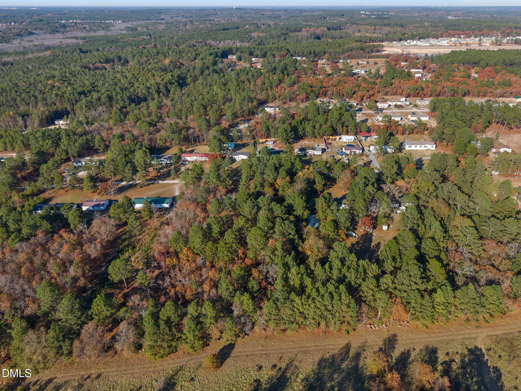 948 Pine Oak Cameron, NC 28326 - Photo 12 of 12 an aerial view of residential houses with outdoor space and trees