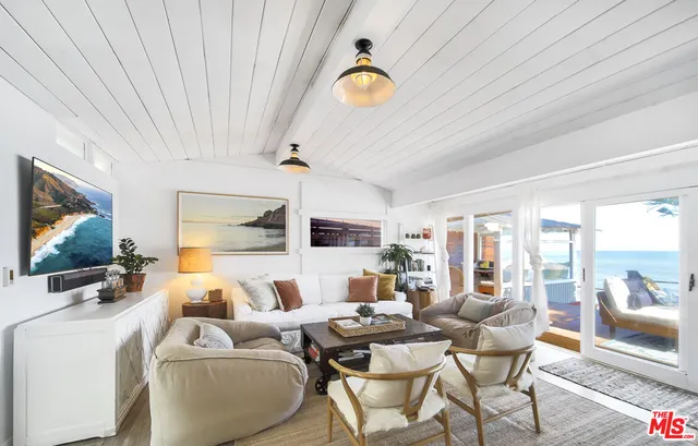 a kitchen with a sink and refrigerator