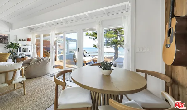 a view of a chairs and table on the terrace