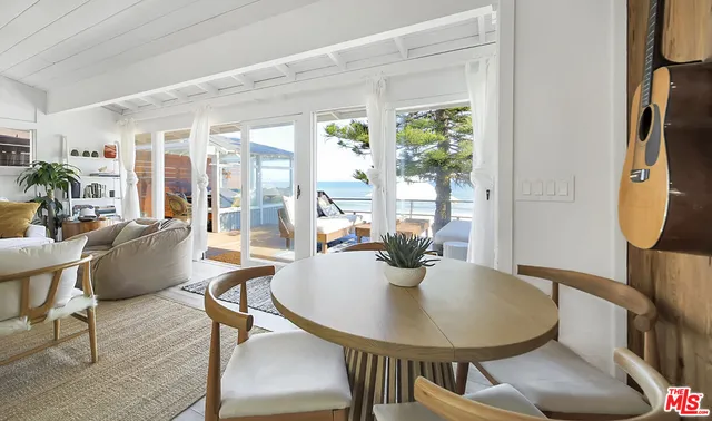 a view of a chairs and table on the terrace