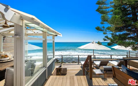 a view of a town with barn house