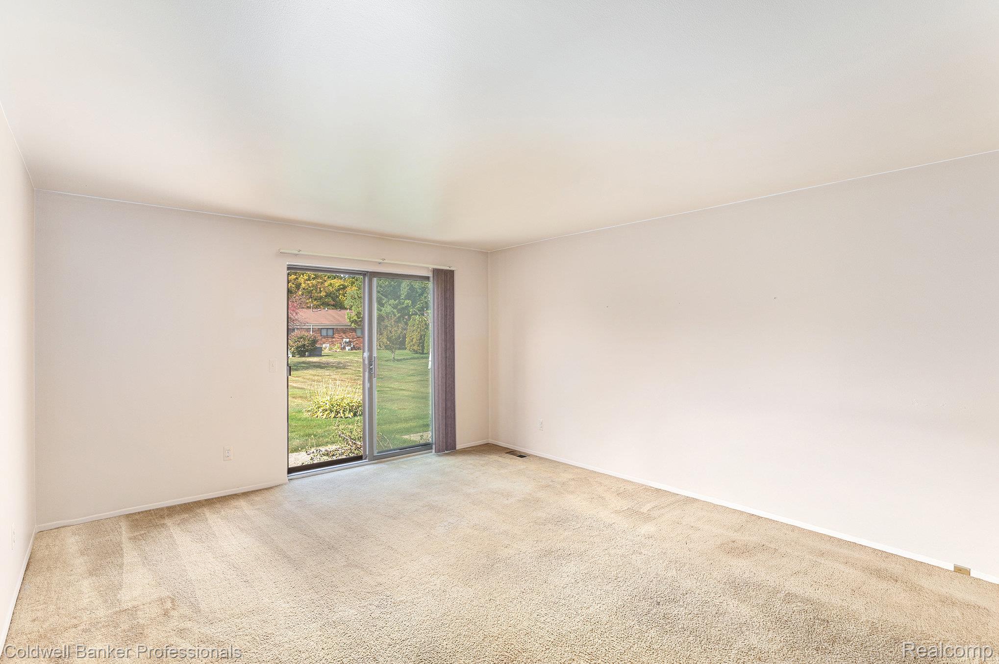 57295 Beaconsfield Road Washington, MI 48094 - Photo 4 of 20 Spare room featuring carpet and baseboards