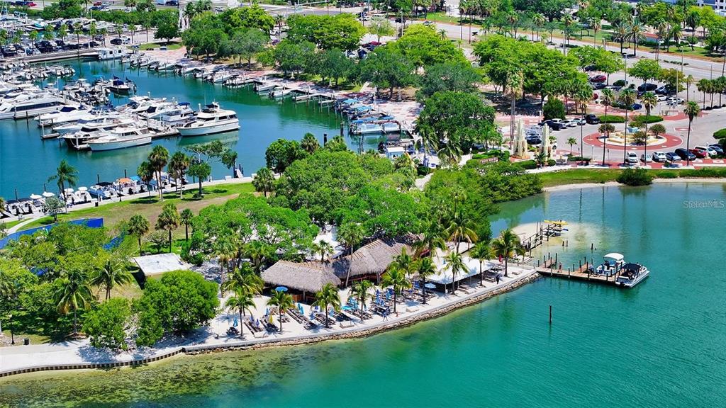 301 Quay Commons, Unit 1011 Sarasota, FL 34236 - Photo 42 of 75 an aerial view of a house with a garden and lake view