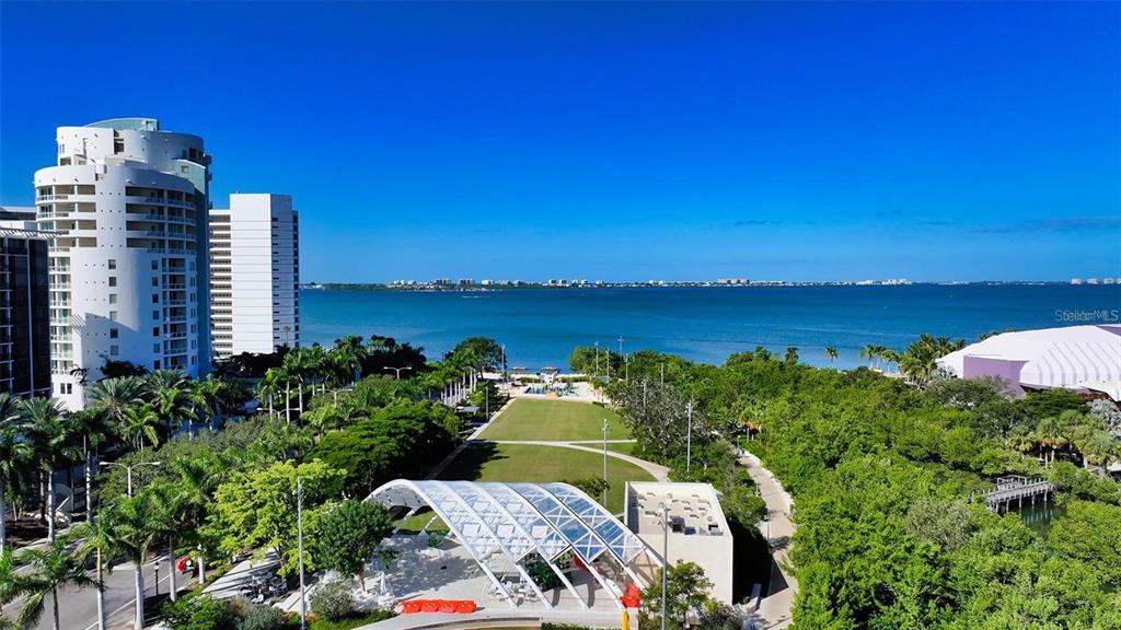 301 Quay Commons, Unit 1011 Sarasota, FL 34236 - Photo 44 of 75 a view of a city with tall buildings in the background