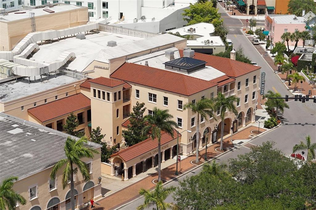 301 Quay Commons, Unit 1011 Sarasota, FL 34236 - Photo 52 of 75 a aerial view of a house with a yard