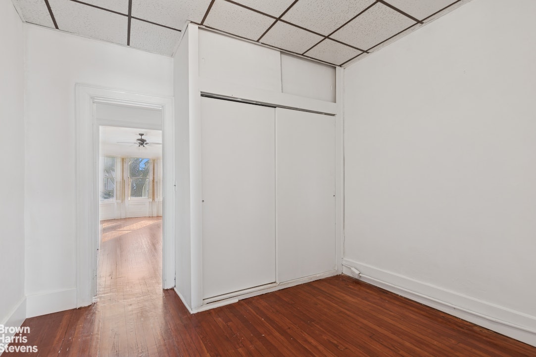 251 Rutland Road Brooklyn, NY 11225 - Photo 9 of 16 a view of small space with wooden floor
