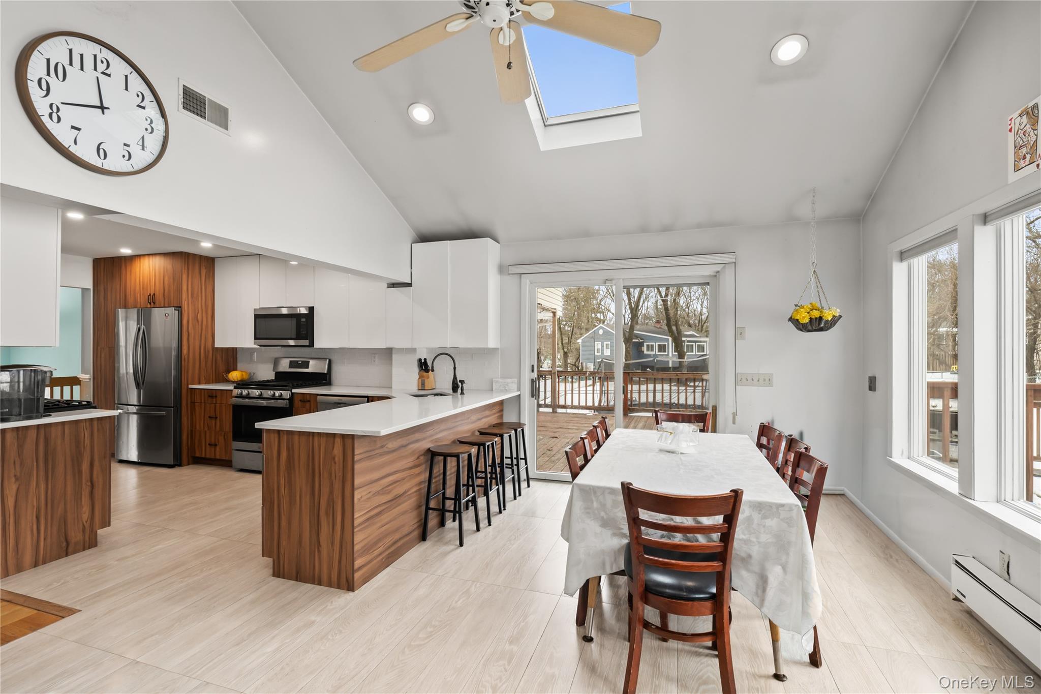 11 Castle Drive Chestnut Ridge, NY 10977 - Photo 14 of 34 a large kitchen with a table and chairs