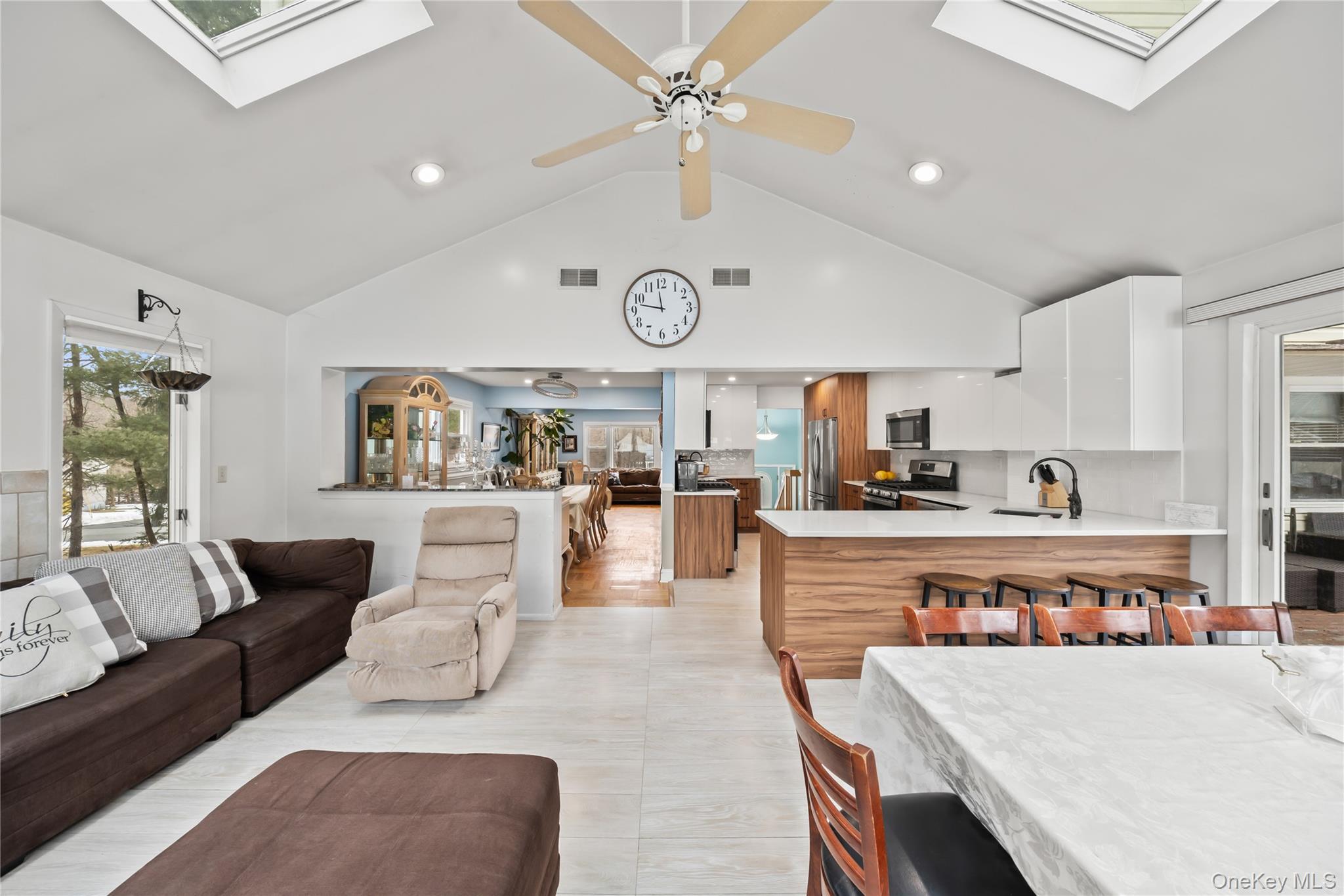11 Castle Drive Chestnut Ridge, NY 10977 - Photo 15 of 34 a living room with stainless steel appliances furniture and a kitchen view