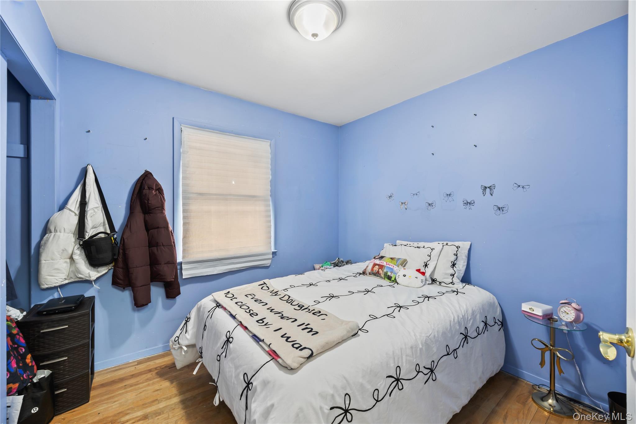 11 Castle Drive Chestnut Ridge, NY 10977 - Photo 16 of 34 a bedroom with a bed and a window