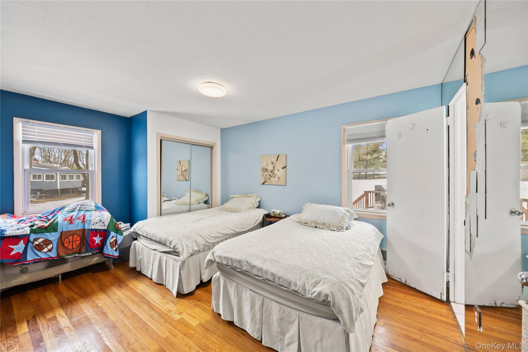 11 Castle Drive Chestnut Ridge, NY 10977 - Photo 18 of 34 a bedroom with two beds and a dresser