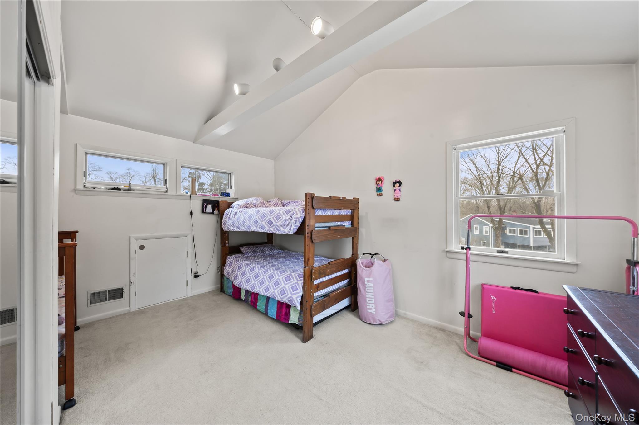 11 Castle Drive Chestnut Ridge, NY 10977 - Photo 23 of 34 a bedroom with a bed and a furniture