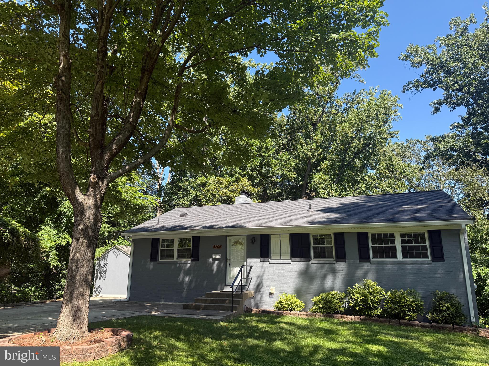 5206 Easton Drive Springfield, VA 22151 - Photo 1 of 39 a front view of house with yard and green space