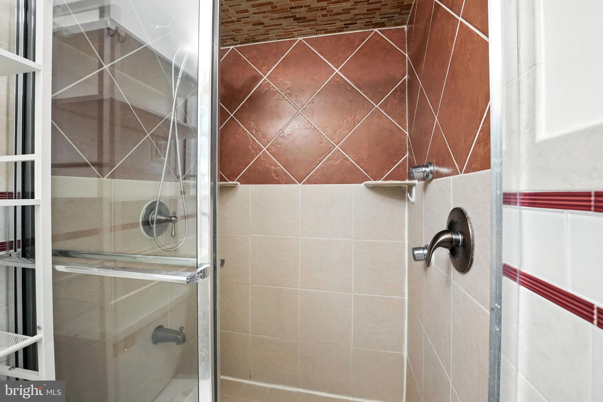 5206 Easton Drive Springfield, VA 22151 - Photo 15 of 39 a bathroom with a shower