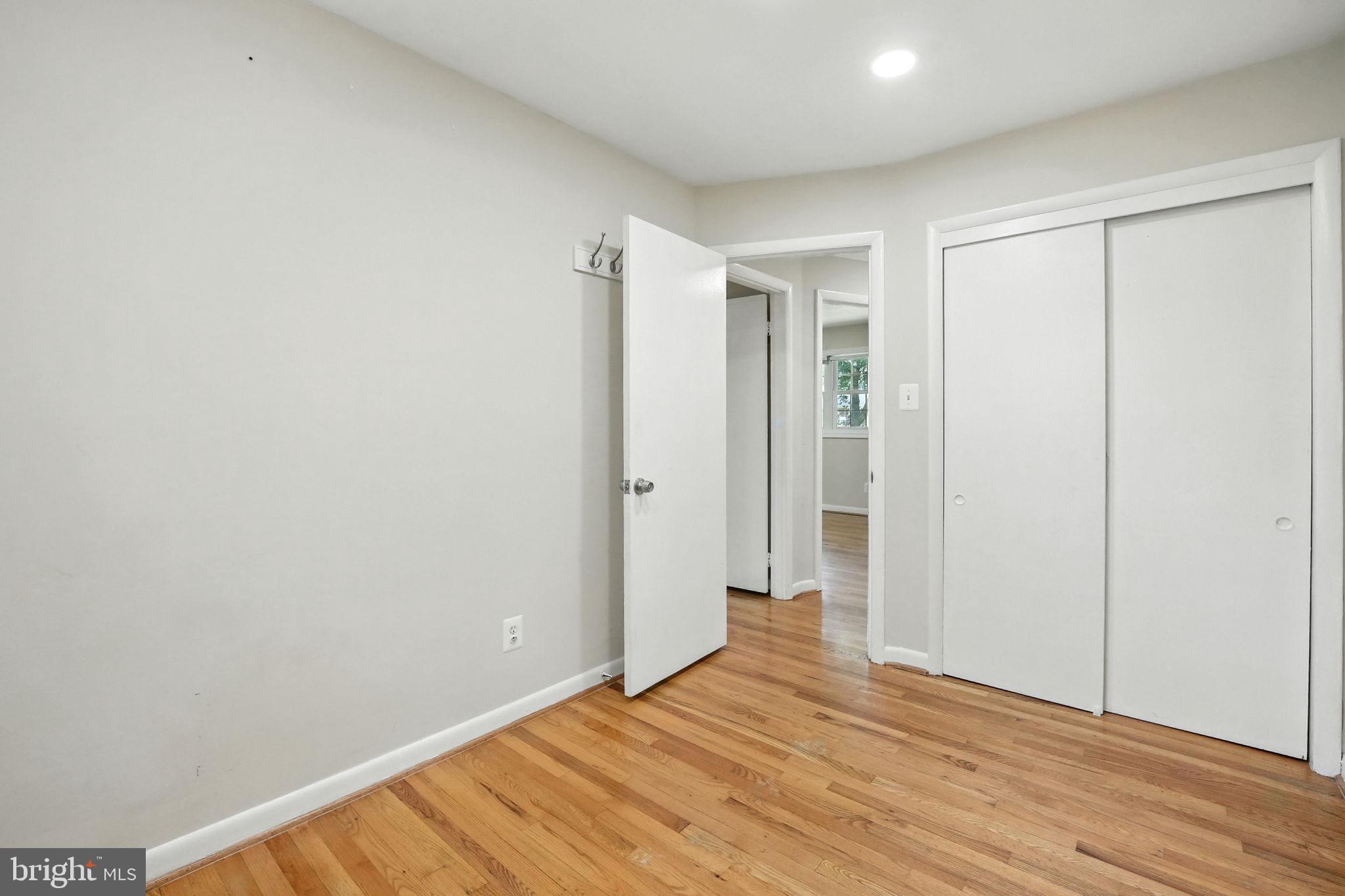 5206 Easton Drive Springfield, VA 22151 - Photo 17 of 39 a view of an empty room with wooden floor