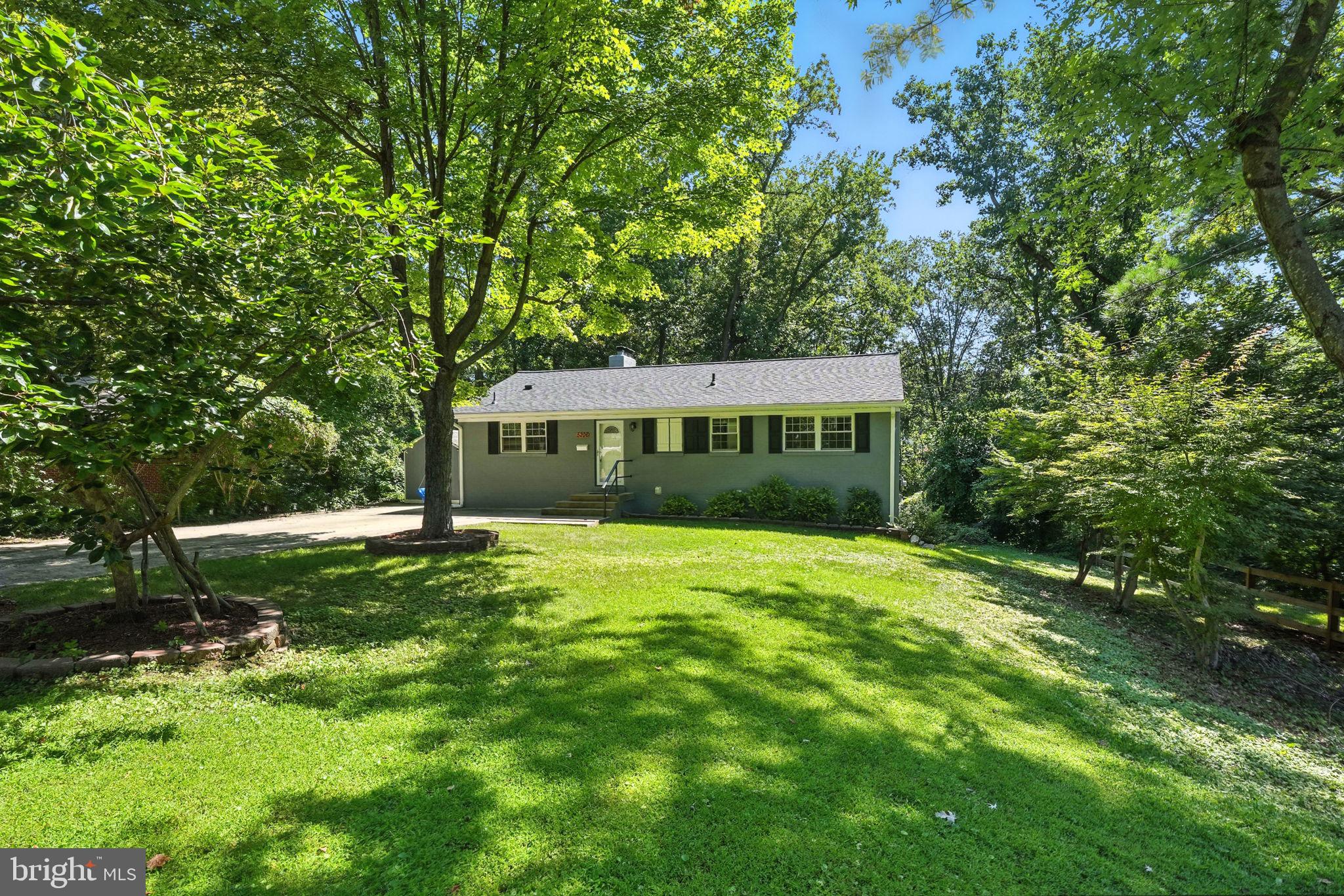 5206 Easton Drive Springfield, VA 22151 - Photo 2 of 39 a view of an house with backyard space and balcony