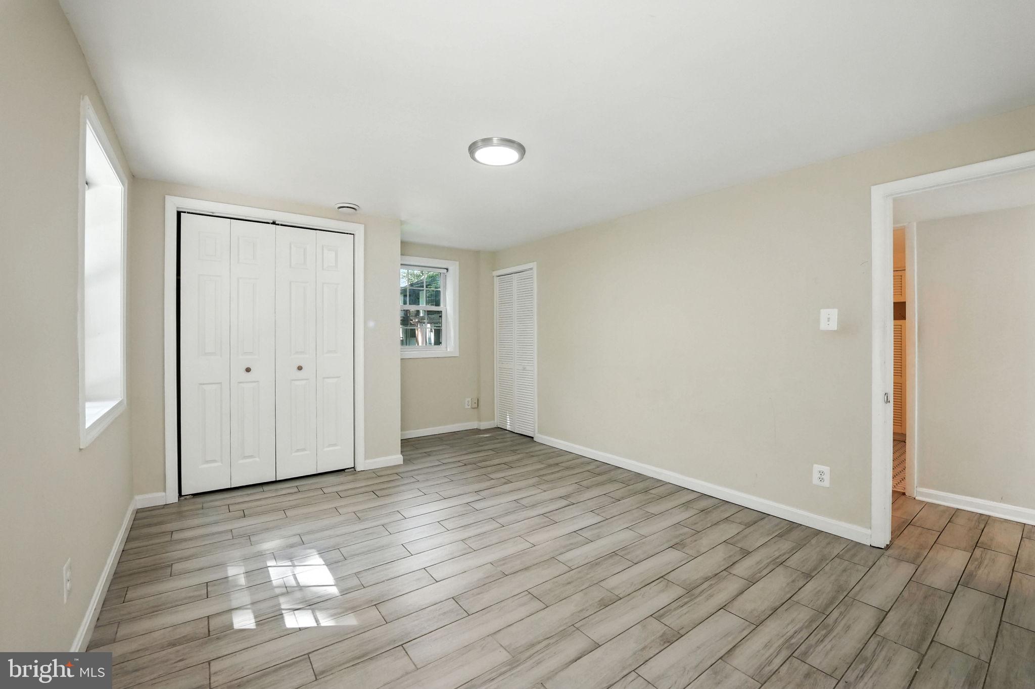 5206 Easton Drive Springfield, VA 22151 - Photo 29 of 39 an empty room with wooden floor