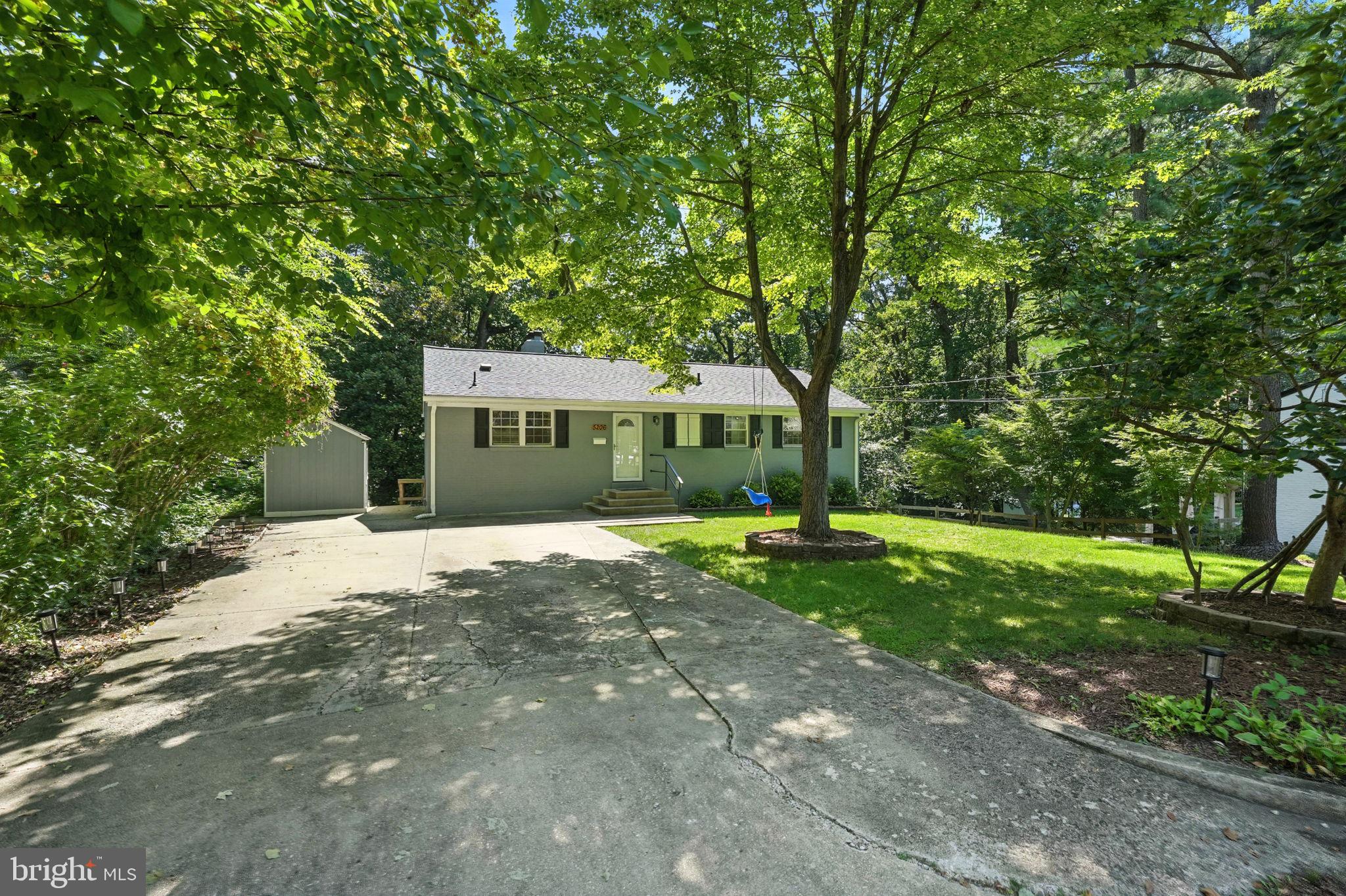 5206 Easton Drive Springfield, VA 22151 - Photo 3 of 39 a front view of a house with yard and green space
