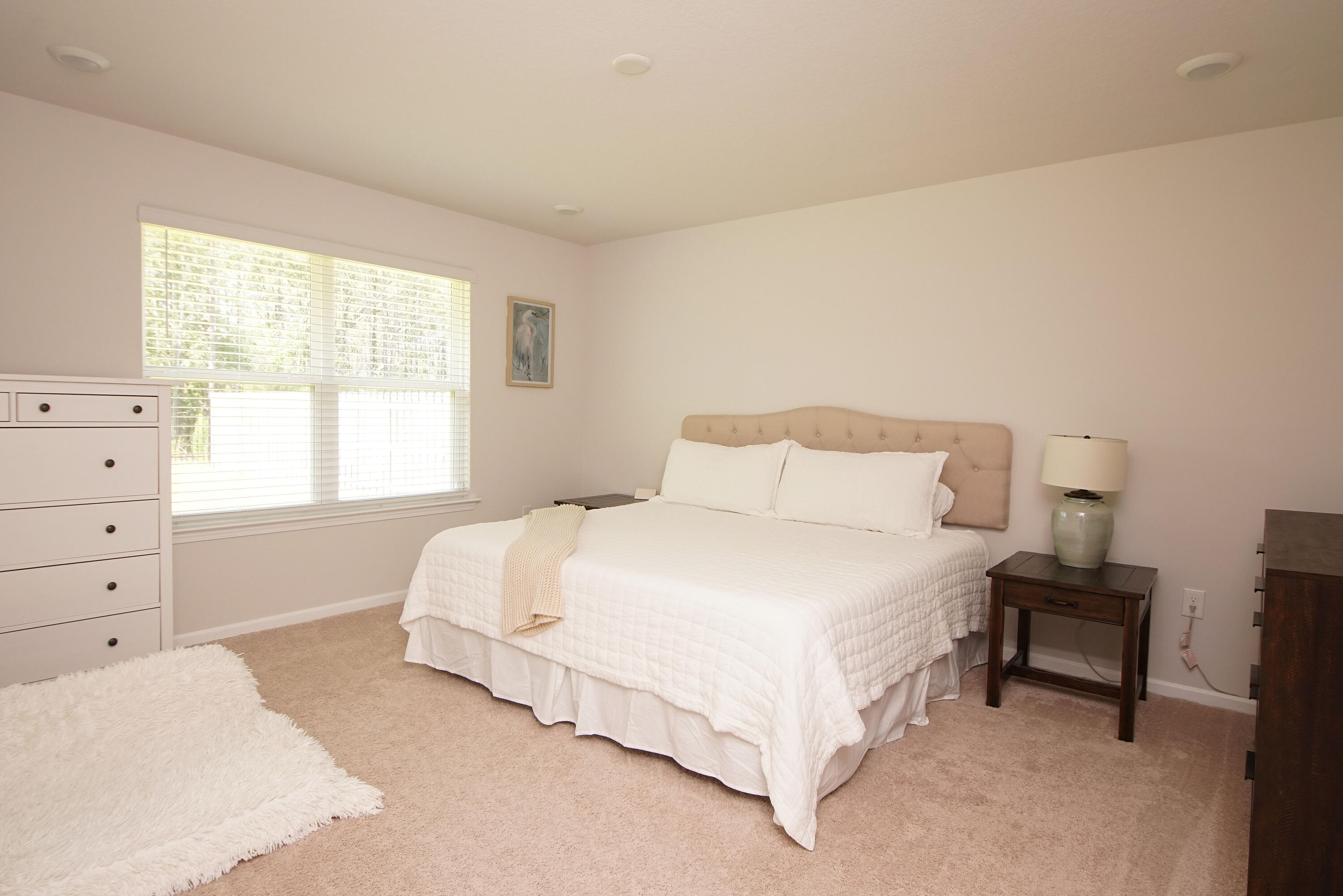 334 This Way Freeport, FL 32439 - Photo 26 of 56 a bedroom with a bed and a window