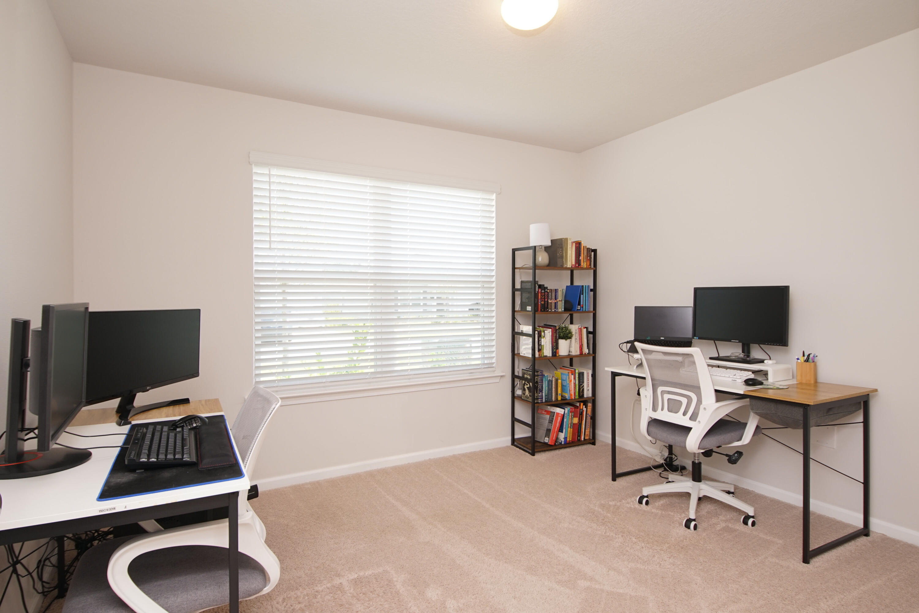 334 This Way Freeport, FL 32439 - Photo 34 of 56 a view of a workspace with furniture and a window