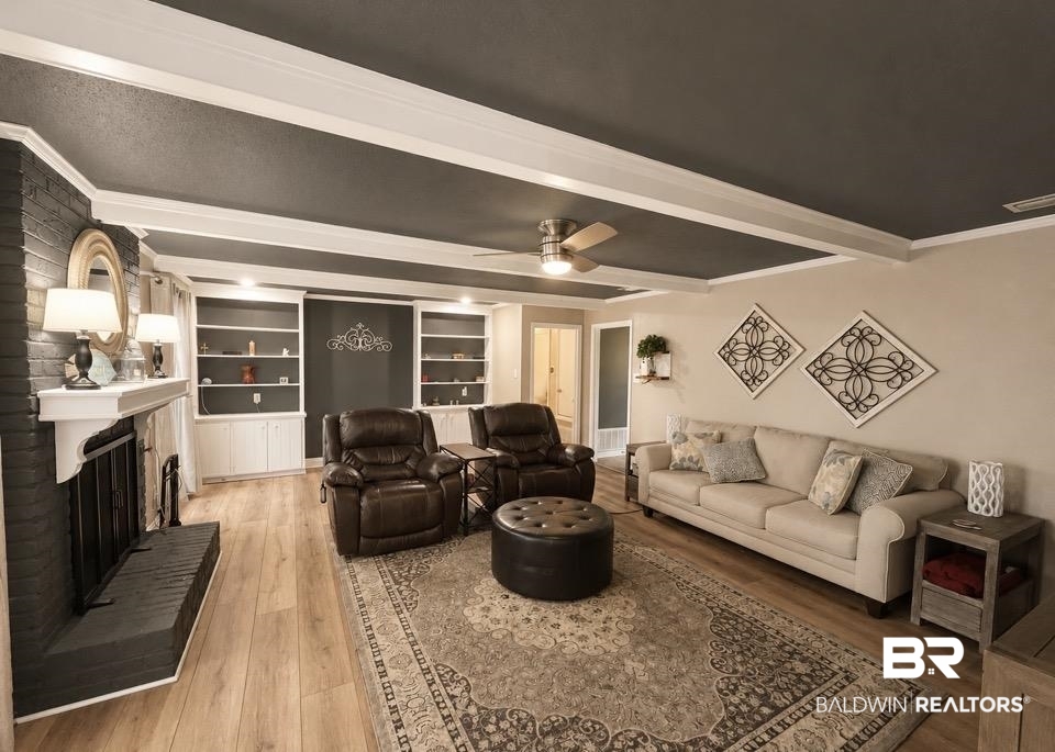 6429 Pinehurst Run Mobile, AL 36608 - Photo 6 of 15 Living area featuring wood-finish flooring and a coffered ceiling with recessed lighting