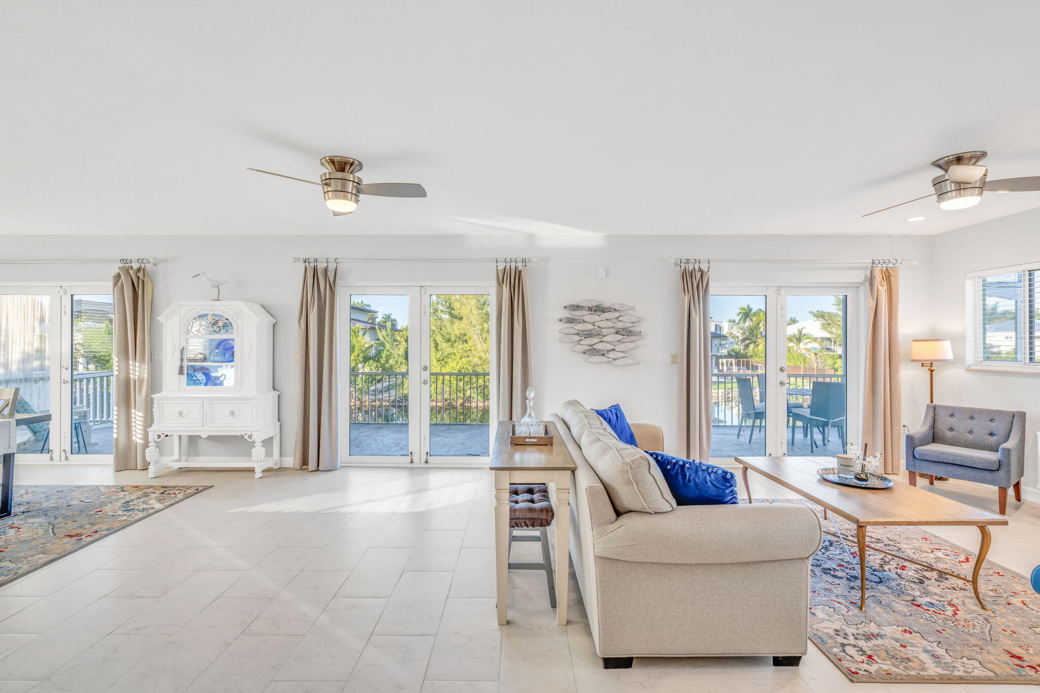24 Mutiny Place Key Largo, FL 33037 - Photo 12 of 57 a living room with furniture and a large window