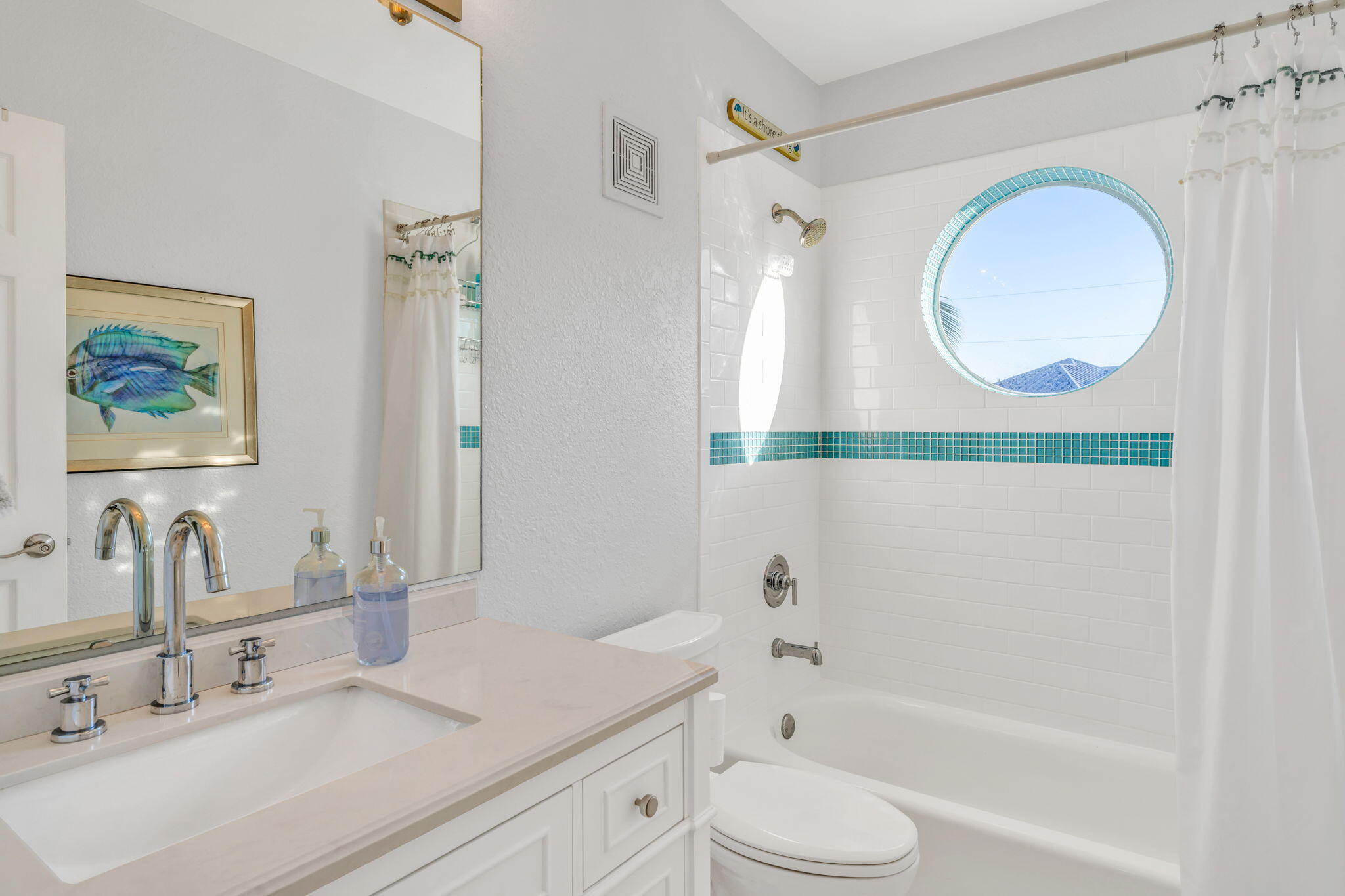 24 Mutiny Place Key Largo, FL 33037 - Photo 20 of 57 a bathroom with a sink a toilet and a mirror