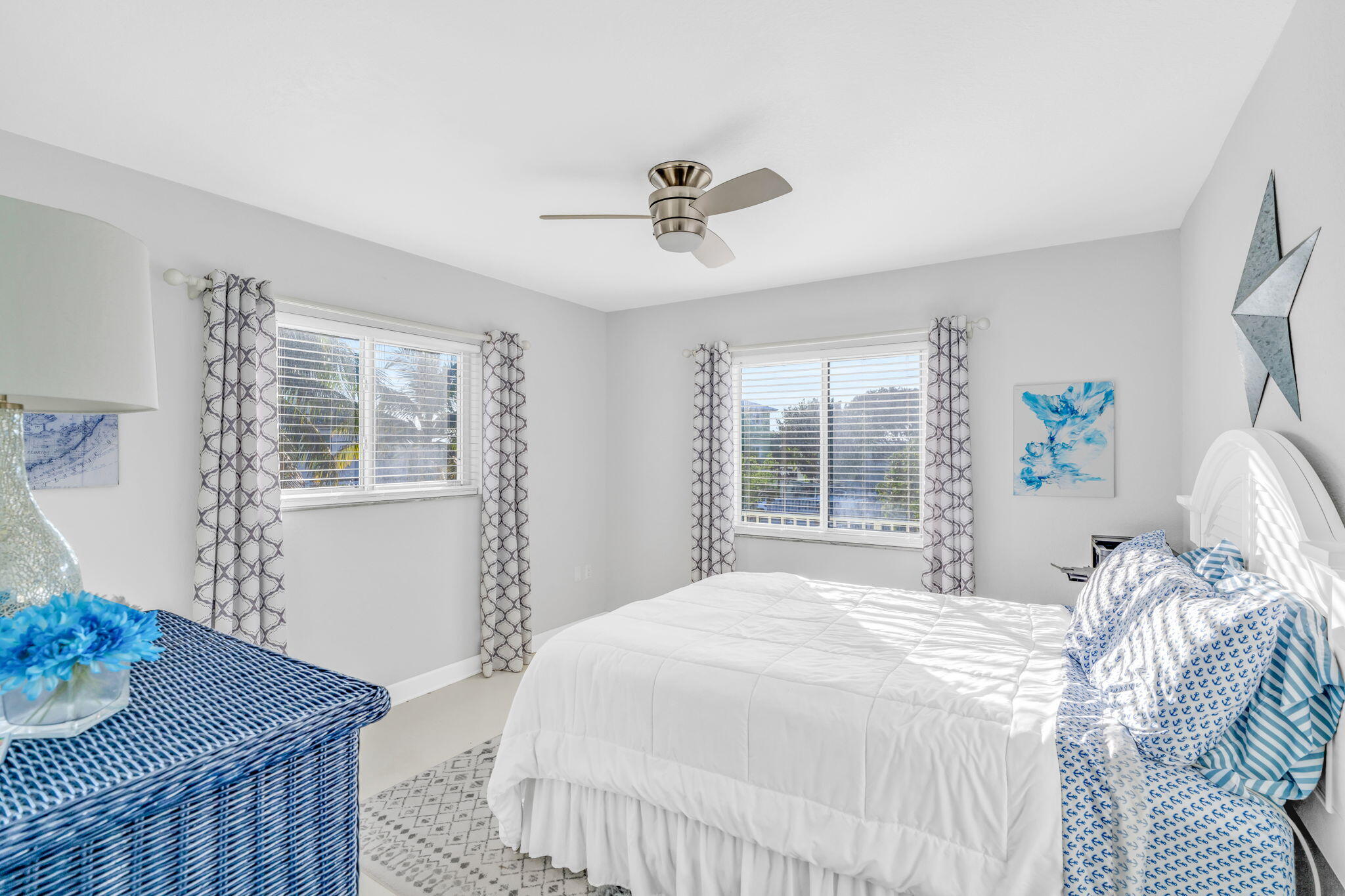 24 Mutiny Place Key Largo, FL 33037 - Photo 22 of 57 a bedroom with a bed and wooden floor
