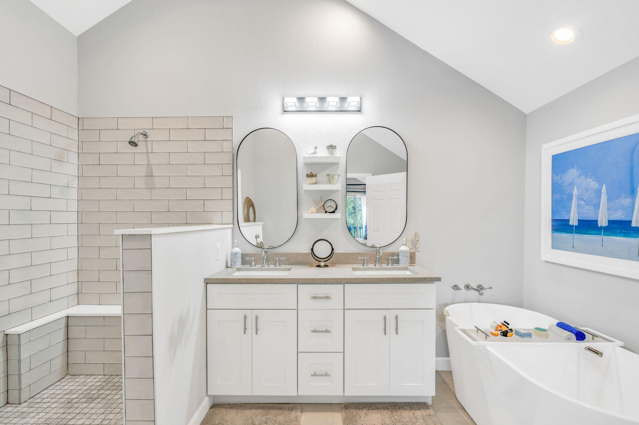 24 Mutiny Place Key Largo, FL 33037 - Photo 31 of 57 a bathroom with a double vanity sink and a mirror